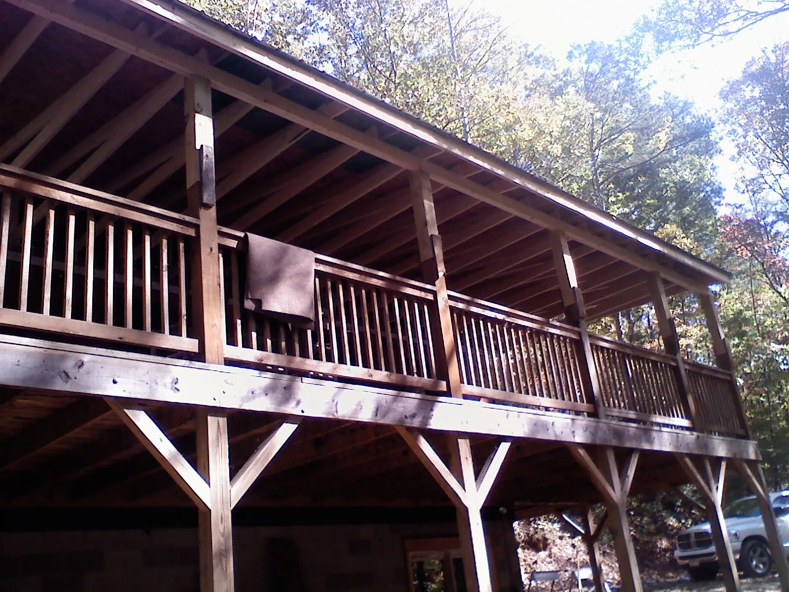 Timber framing under a new elevated porch and deck — Roof Leak Repair in Leadville by Roofing Brothers